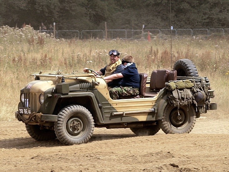 Austin Champ licence registration'38 BE 44' driving around in the arena